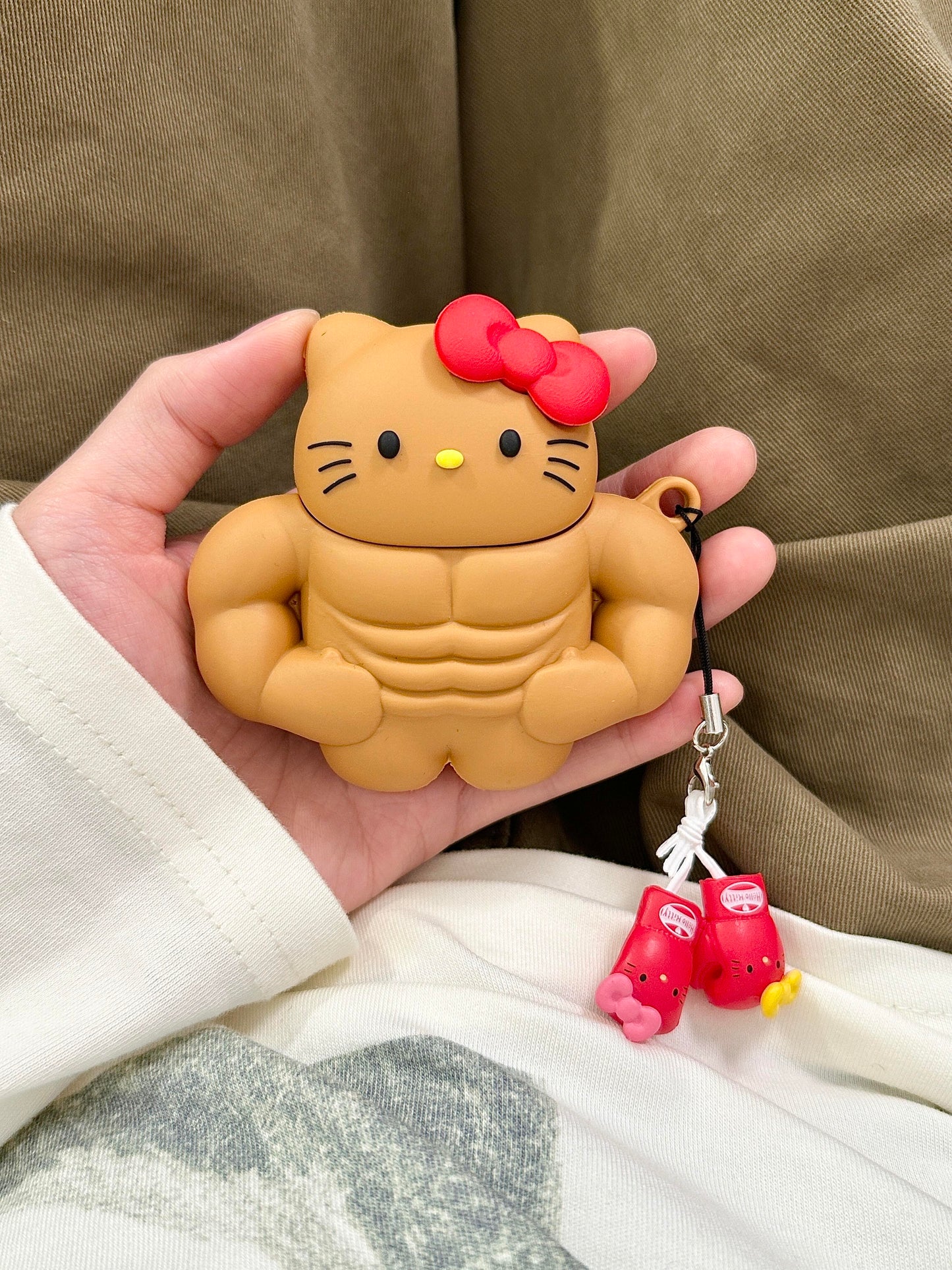 Tan Hellokitty Muscle Fitness Shape Silicone Headphone Case Airpods with Chain